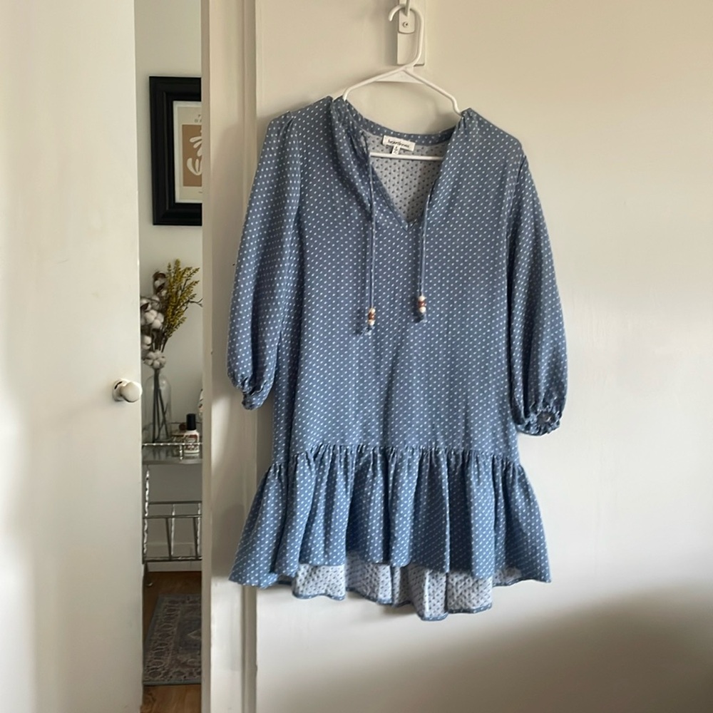 Pale blue long sleeve dress with straps and beads on the ends